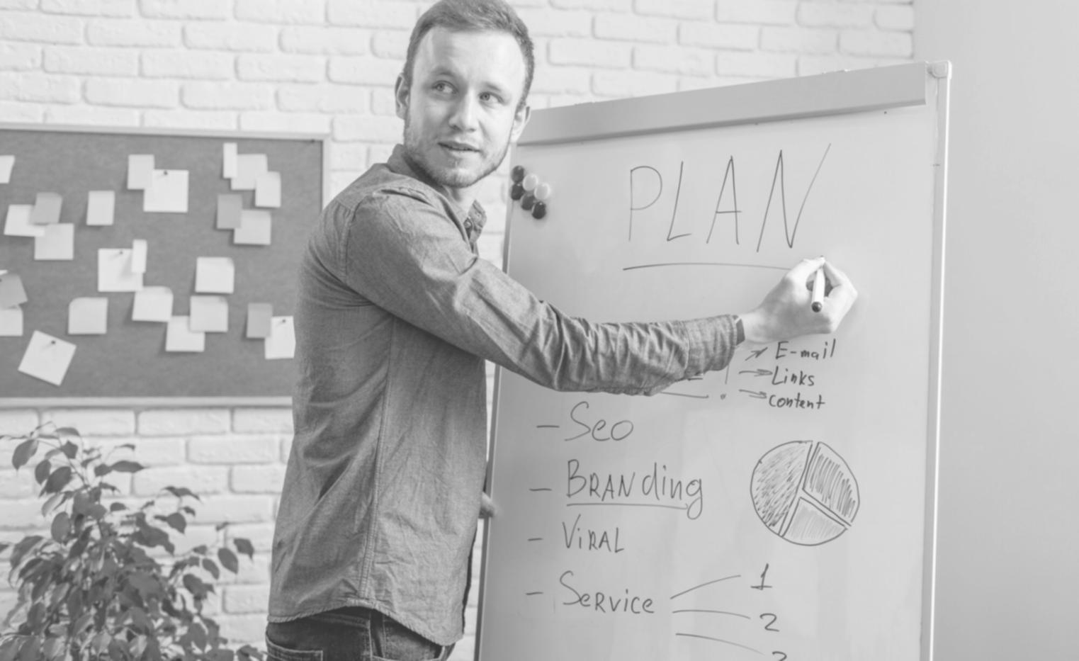 Professional team collaboration session with financial documents and strategic planning materials